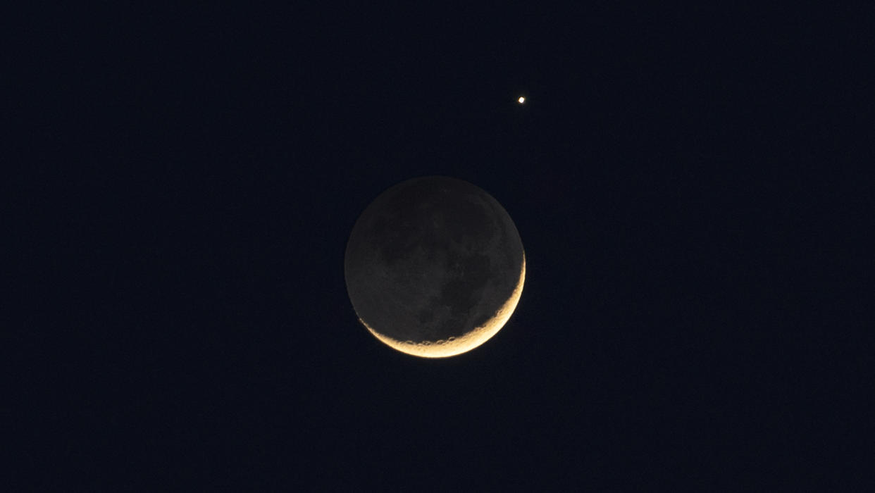  Venus and the crescent moon are pictured on March 24, 2023 in Changchun, Jilin Province, China 