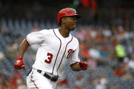 Washington Nationals' Michael A. Taylor watches his solo home run as he rounds the bases in the second inning of a baseball game against the Philadelphia Phillies, Thursday, Sept. 26, 2019, in Washington. (AP Photo/Patrick Semansky)