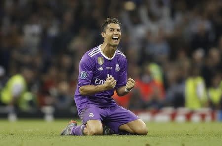 Britain Soccer Football - Juventus v Real Madrid - UEFA Champions League Final - The National Stadium of Wales, Cardiff - June 3, 2017 Real Madrid's Cristiano Ronaldo celebrates after winning the UEFA Champions League Final Reuters / Carl Recine Livepic