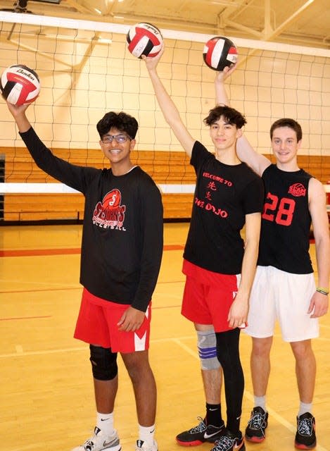 St. John’s volleyball captains, from left, Suraj Marla, Eric Barcelos and Francis McGonagle.