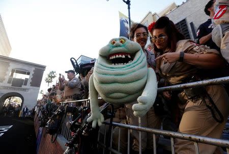 Fans wait at the premiere of the film "Ghostbusters" in Hollywood, California U.S., July 9, 2016. REUTERS/Mario Anzuoni