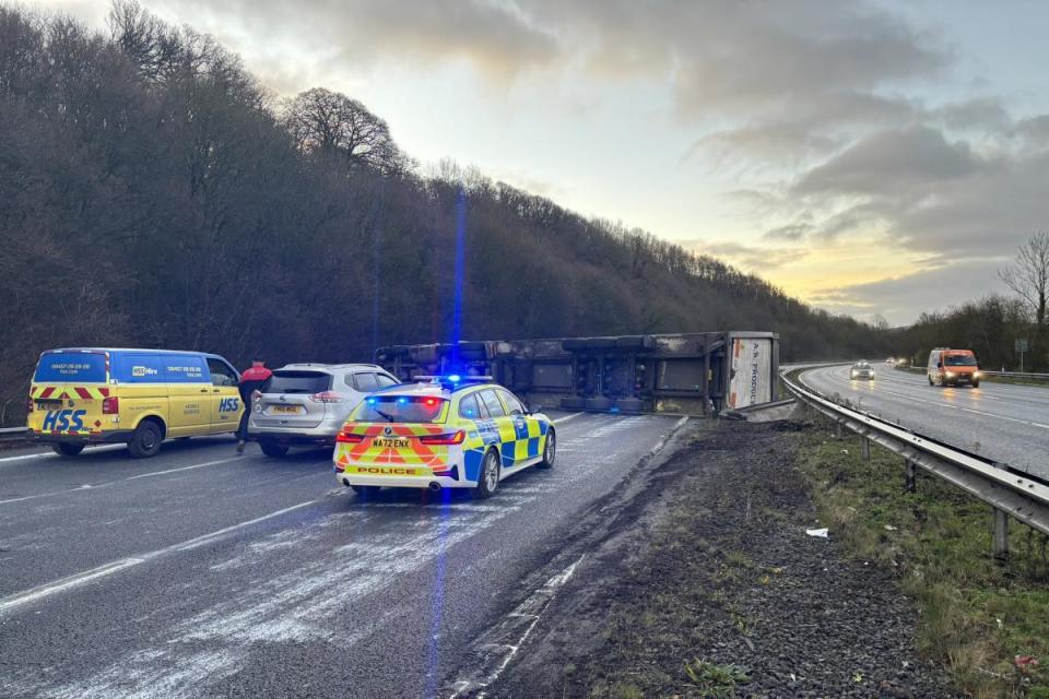 Emergency services have closed a section of the M5 in Devon after a lorry overturned i(Image: Devon and Cornwall Roads Policing Team)/i