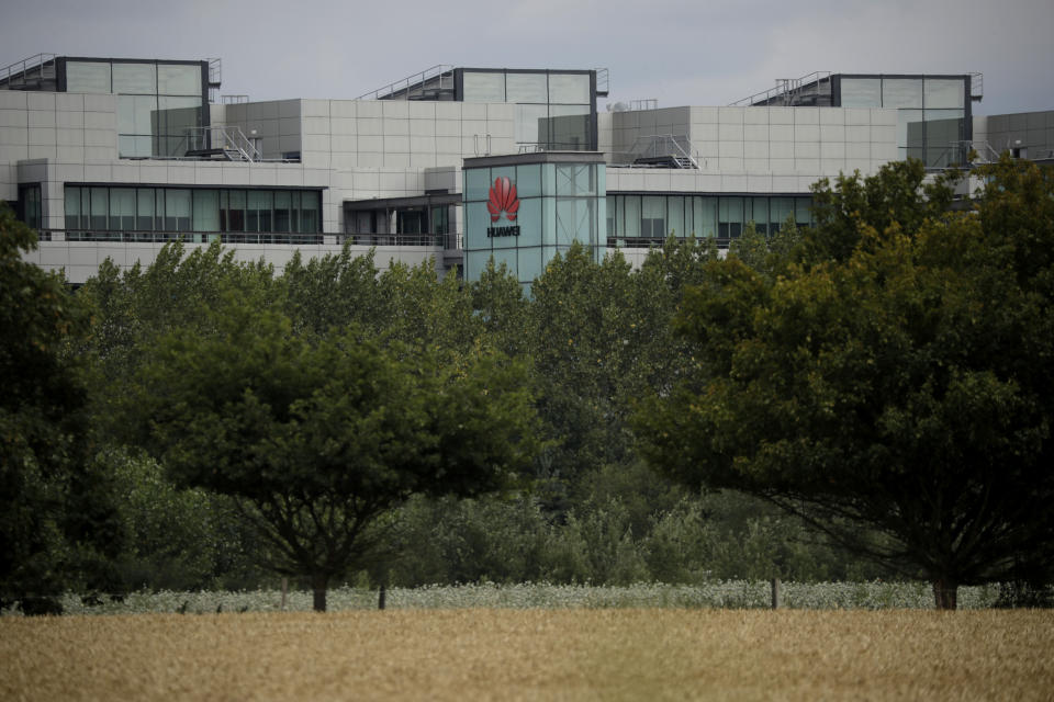 A Huawei sign is displayed on their premises in Reading, England, Tuesday, July 14, 2020. Britain's government on Tuesday backtracked on plans to give Chinese telecommunications company Huawei a limited role in the U.K.'s new high-speed mobile phone network in a decision with broad implications for relations between London and Beijing. (AP Photo/Matt Dunham)