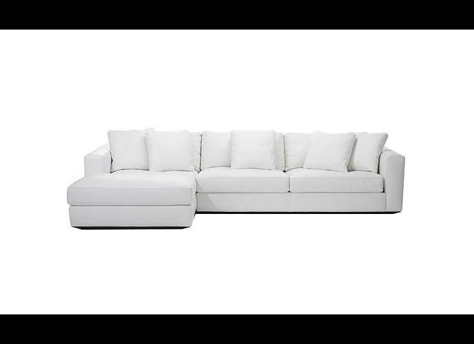 Reid Sectional Chaise in Leather, <a href="http://www.dwr.com/product/reid-sectional-chaise-left.do?sortby=ourPicks&utm_source=affiliate&utm_medium=affiliate&utm_content=NO&utm_campaign=Primary&prfrm=1&cmp=AFC-GB9049936277" target="_hplink">Design Within Reach</a>