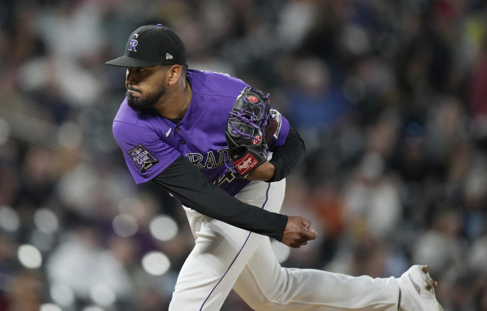 Colorado Rockies starting pitcher German Marquez works against the Arizona Diamondbacks in the seventh inning of a baseball game Friday, May 21, 2021, in Denver. (AP Photo/David Zalubowski)