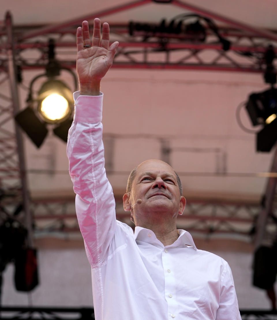 Olaf Scholz, German Finance Minister and top candidate for Chancellor, speaks at the final election campaign event of the Social Democratic Party, SPD, in Cologne, Germany, Friday, Sept. 24, 2021. The German elections will take place next Sunday, Sept. 26. (AP Photo/Martin Meissner, POOL)