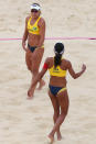 LONDON, ENGLAND - JULY 28: Larissa Franca (R) and Juliana Silva of Brazil in action during the Women's Beach Volleyball Preliminary Round on Day 1 of the London 2012 Olympic Games at Horse Guards Parade on July 28, 2012 in London, England. (Photo by Ryan Pierse/Getty Images)