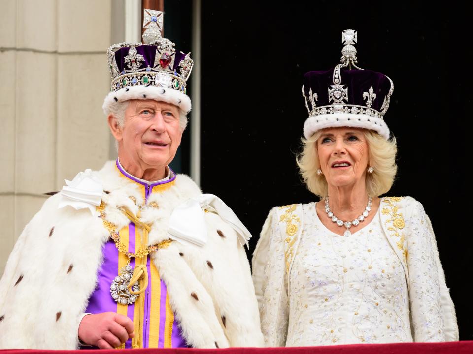 King Charles III and Queen Camilla on the balcony of Buckingham Palace after their coronation.