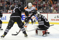 New Jersey Devils goaltender Mackenzie Blackwood (29) makes a save as he is screened by Philadelphia Flyers right wing Travis Konecny (11) during the second period of an NHL hockey game Wednesday, Dec. 8, 2021, in Newark, N.J. (AP Photo/Bill Kostroun)