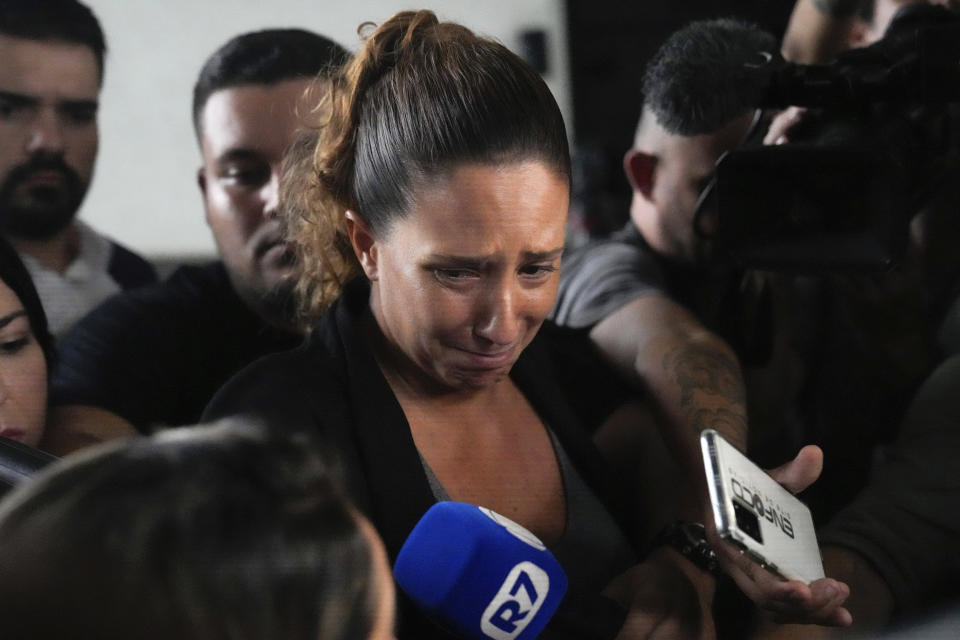 Monica Benicio, partner of slain councilwoman Marielle Franco, speaks to journalists at the Federal Police headquarters in Rio de Janeiro, Brazil, March 24, 2024. Police arrested on Sunday the men suspected of ordering Franco's killing in 2018. (AP Photo/Silvia Izquierdo)