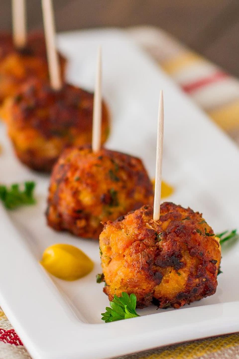 <p>A dash of maple syrup does wonders for this sweet and lean appetizer. </p><p><strong>Get the recipe at <a href="http://www.jocooks.com/main-courses/poultry-main-courses/sweet-potato-turkey-meatballs/" rel="nofollow noopener" target="_blank" data-ylk="slk:Jo Cooks;elm:context_link;itc:0;sec:content-canvas" class="link ">Jo Cooks</a>.</strong></p>