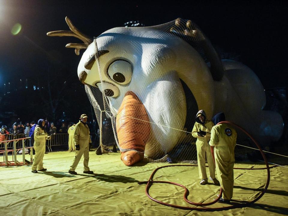 The Olaf balloon is inflated (Getty)