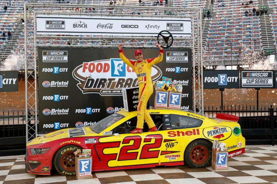 Joey Logano celebrates after winning a NASCAR Cup Series auto race, Monday, March 29, 2021, in Bristol, Tenn.