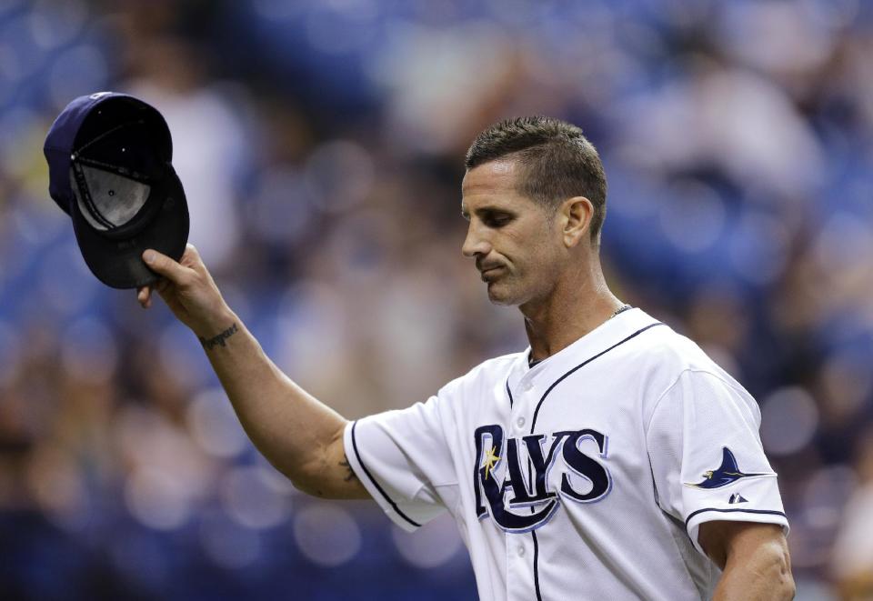 Grant Balfour acknowledges the boos. (AP)