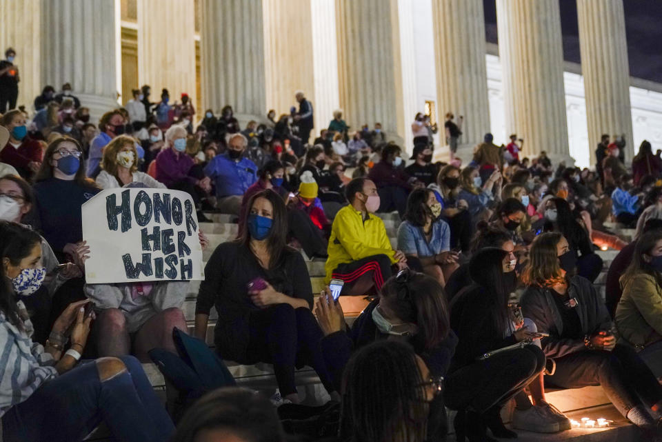 People gather at the Supreme Court on Friday night to honor Supreme Court Justice Ruth Bader Ginsburg, who died Friday night. (Photo: Alex Brandon/ASSOCIATED PRESS)