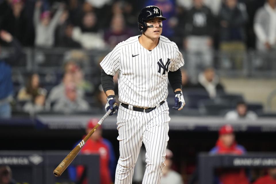 New York Yankees' Anthony Rizzo reacts after hitting a two run home run during the fifth inning of an baseball game against the Philadelphia Phillies, Monday, April 3, 2023, in New York. (AP Photo/Frank Franklin II)