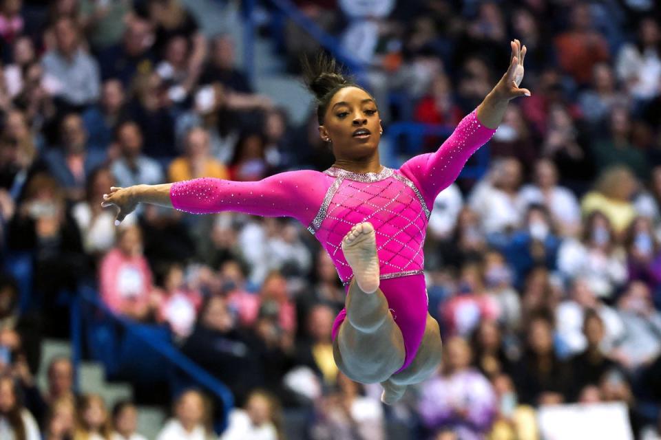 US gymnast Simone Biles competes in the floor event during the Core Hydration Classic at XL Center in Hartford, Connecticut (AFP via Getty Images)