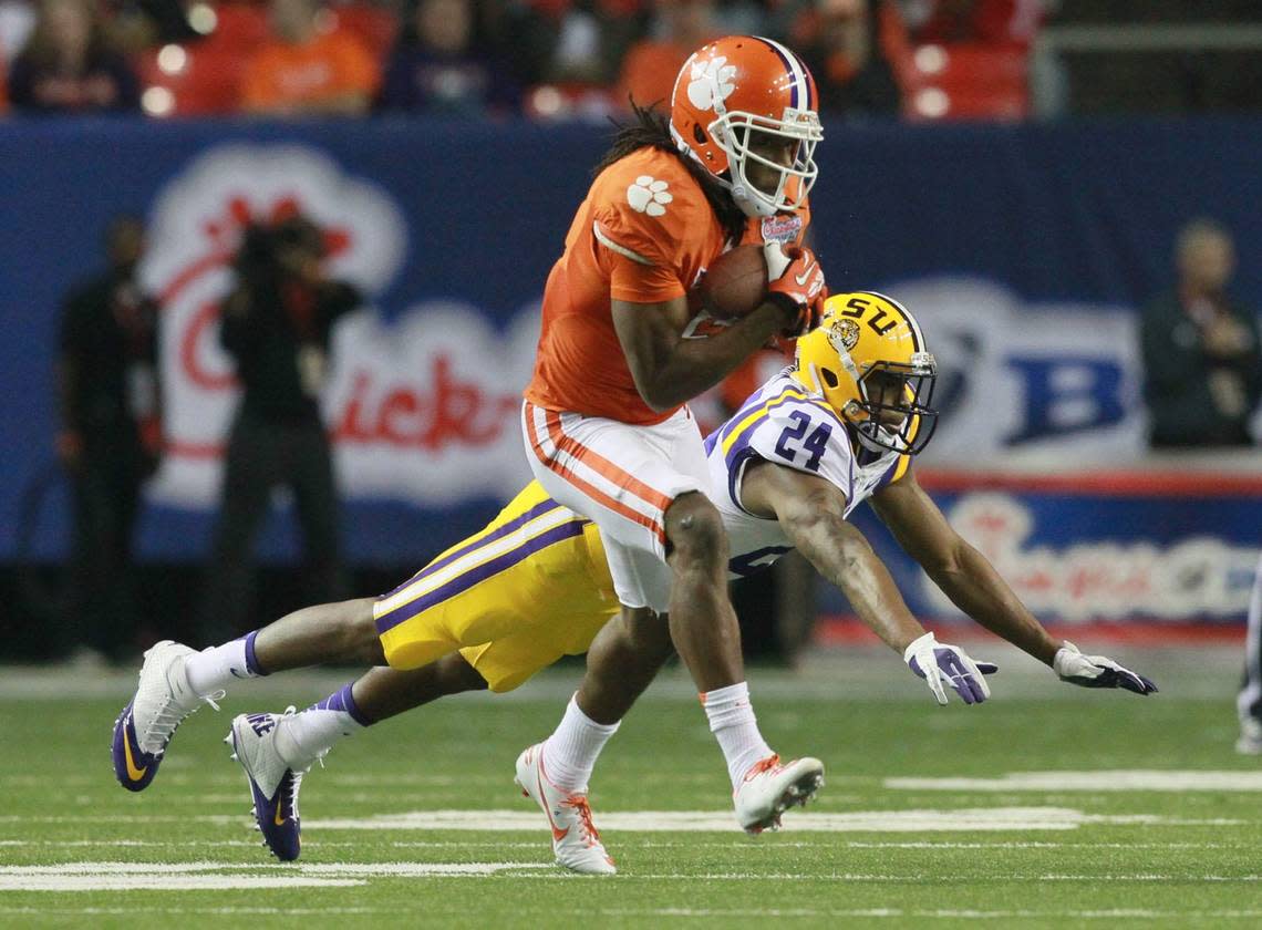 Clemson wide receiver DeAndre Hopkins catches a ball for a first down during the fourth quarter at the Chick-Fil-A Bowl vs. LSU at the Georgia Dome in Atlanta, Ga. in 2013.