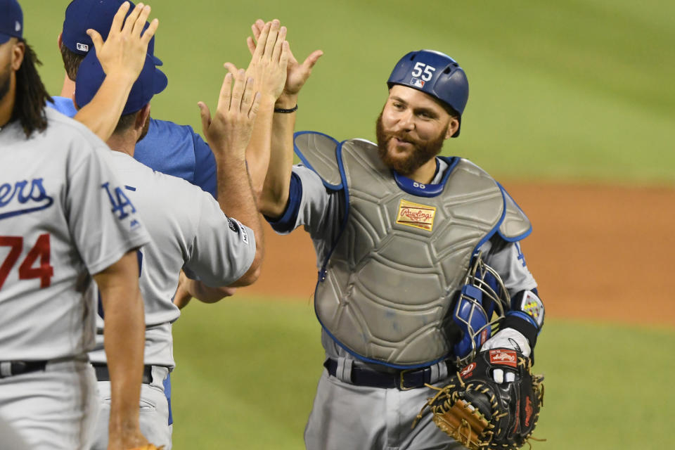 WASHINGTON, DC - JULY 26:  Russell Martin #55 of the Los Angeles Dodgers celebrates a win after a baseball game against the Washington Nationals at Nationals Park on July 26, 2019 in Washington, DC.  (Photo by Mitchell Layton/Getty Images)