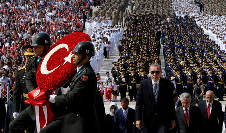 FILE PHOTO: Turkish President Tayyip Erdogan attends a ceremony marking the 96th anniversary of Victory Day at the mausoleum of Mustafa Kemal Ataturk in Ankara, Turkey August 30, 2018./File Photo