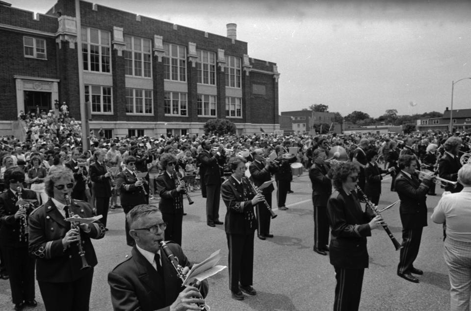 The South Bend Central High School Alumni Band plays familiar Central tunes outside the former high school during the 1983 Ethnic Festival.