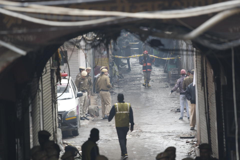 Police officers at the fire site