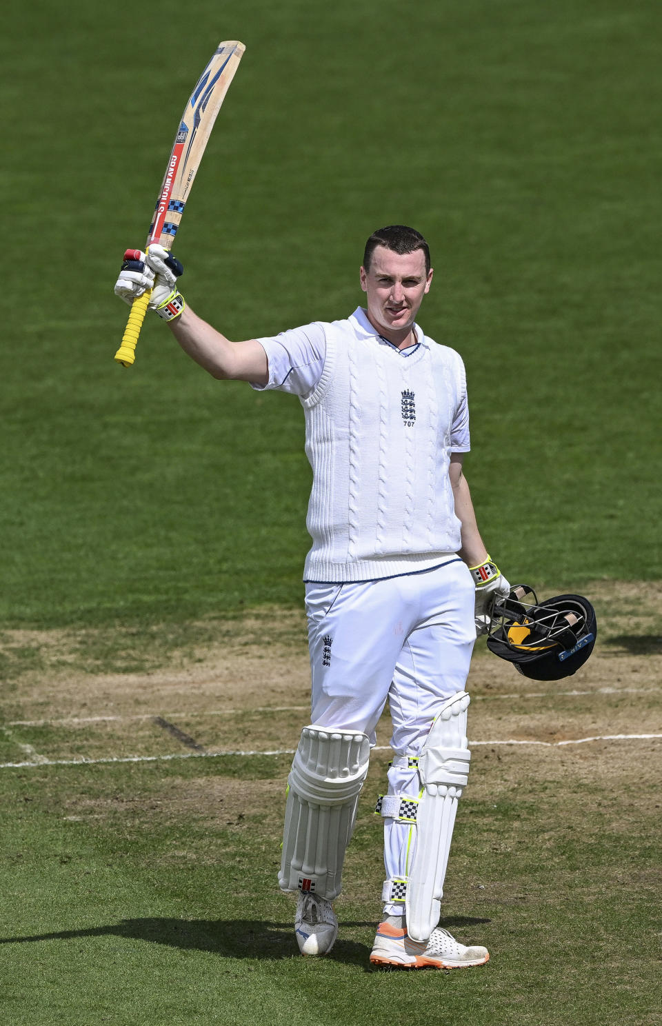 Harry Brook of England celebrates his century on the first day of the second cricket test against New Zealand at the Basin Reserve in Wellington, New Zealand, Friday, Feb. 24, 2023. (Andrew Cornaga/Photosport via AP)