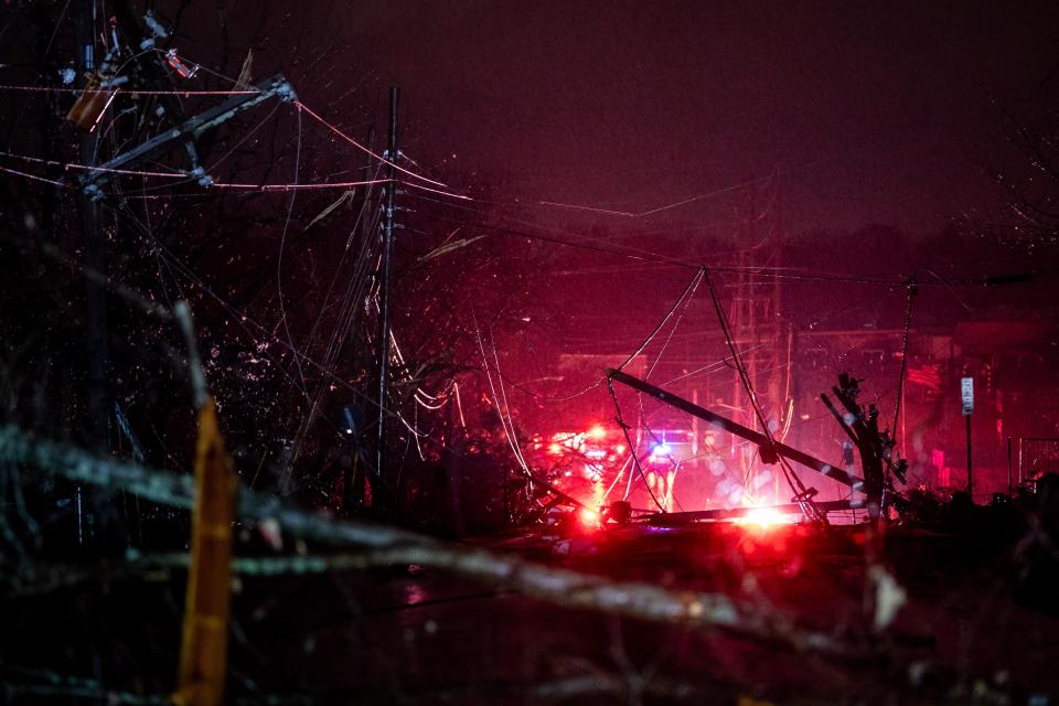 Damage is seen on Nesbitt Lane in the Madison area of Nashville, Tenn., Saturday, Dec. 9, 2023. At least six people are dead and more than 150,000 are without power after storms containing tornadoes and high winds hit Middle Tennessee.