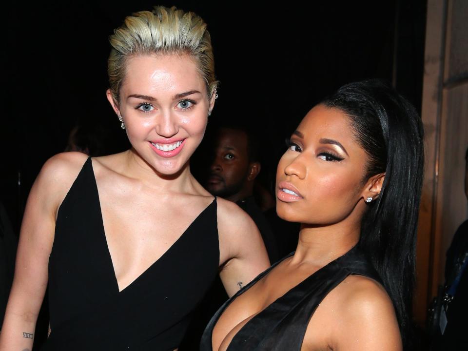 Miley Cyrus and Nicki Minaj backstage at the Grammys on February 8, 2015.