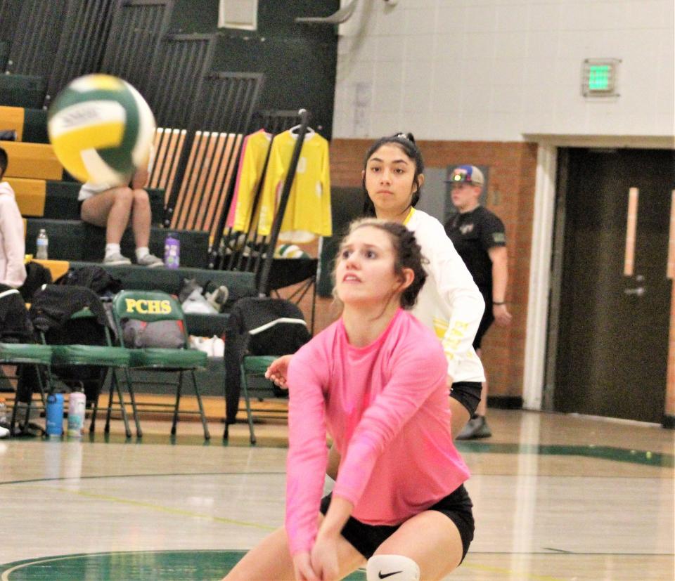 Nina Cowan (no. 12) of Pueblo East sets to dig out the return from Pueblo County on Oct. 25, 2022, at the Hornets Nest.