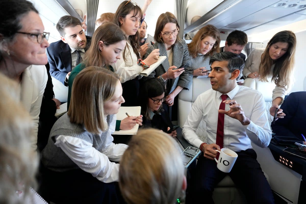 Mr Sunak was quizzed about his election plans on a flight to Poland (Alastair Grant/PA Wire)