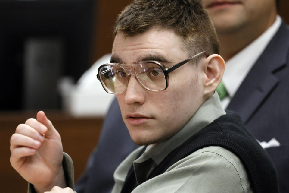 Marjory Stoneman Douglas High School shooter Nikolas Cruz is shown at the defense table during jury selection in the penalty phase of his trial at the Broward County Courthouse in Fort Lauderdale, Fla., on Tuesday, June 28, 2022. The jury that is seated will decide whether Cruz is sentenced to death or receives life without parole for murdering 17 people at the school on Feb. 14, 2018. (Amy Beth Bennett/South Florida Sun-Sentinel via AP, Pool)