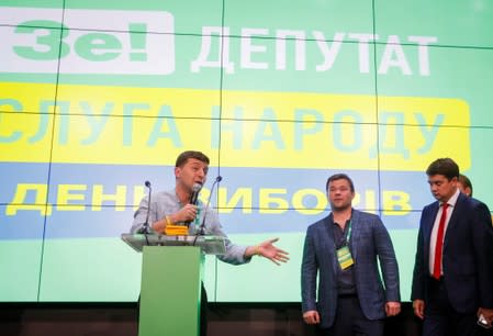 Ukraine's President Volodymyr Zelenskiy speaks at his party's headquarters after a parliamentary election in Kiev