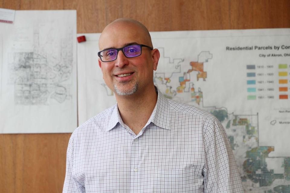 Jason Segedy, Director of Planning and Urban Development for the City of Akron, in his office. 