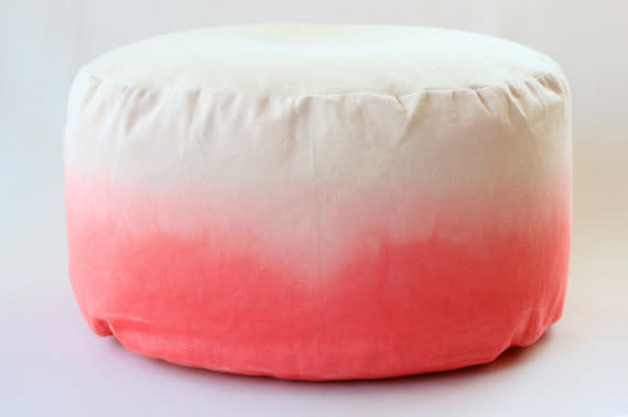 This cozy hand dyed bean bag&nbsp;chair is the perfect addition to brighten any room. Get it on <a href="https://www.etsy.com/listing/150323600/coral-pink-dip-dye-bean-bag-ombre-bean" target="_blank">Etsy</a>.