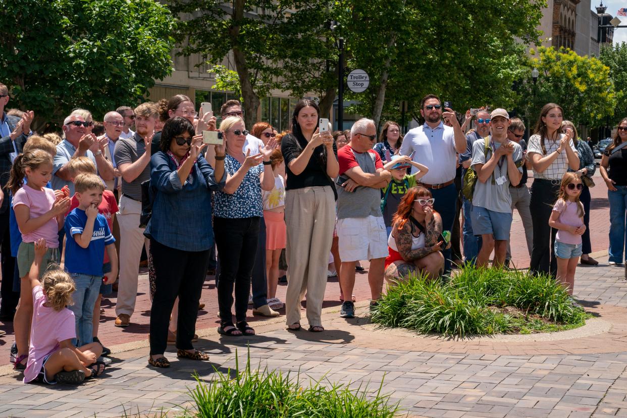 The crowd cheers as officials break ground on The Vault on Main where the former 420 Main Street building stood in Tuesday, May 28, 2024. The $60 million project at Fifth and Main will include 161 residential units, first-floor retail and an underground parking garage.