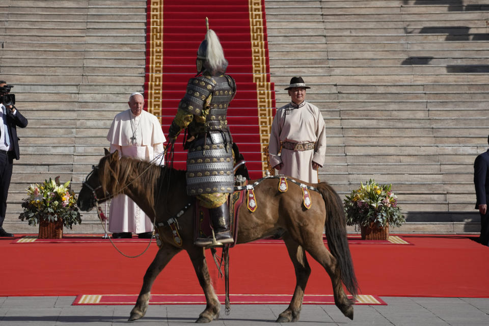 CORRECTS SPELLING OF MONGOLIAN PRESIDENT'S FIRST NAME - Mongolian President Ukhnaagiin Khurelsukh, right, and Pope Francis meet Saturday, Sept. 2, 2023, in front of the Saaral Ordon Government Building in Sukhbaatar Square in Ulaanbaatar. Pope Francis arrived in Mongolia on Friday morning for a four-day visit to encourage one of the world's smallest and newest Catholic communities. (AP Photo/Andrew Medichini)