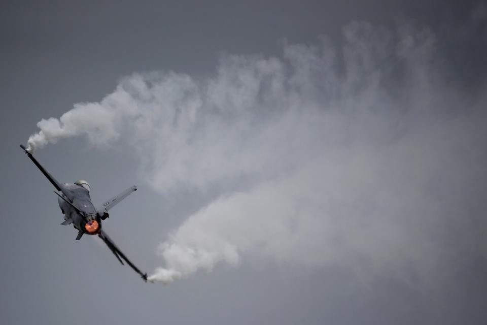 A General Dynamics F-16M Fighting Falcon of the Royal Netherlands Air Force performs during The Royal International Air Tattoo at the RAF in Fairford