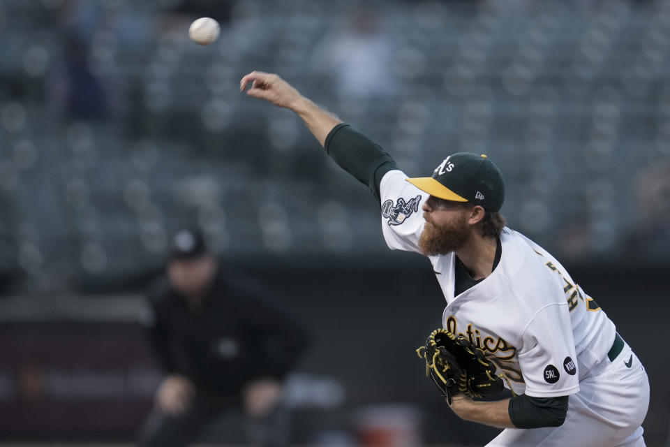 Oakland Athletics pitcher Paul Blackburn throws to a Seattle Mariners batter during the first inning of a baseball game Tuesday, Sept. 19, 2023, in Oakland, Calif. (AP Photo/Godofredo A. Vásquez)