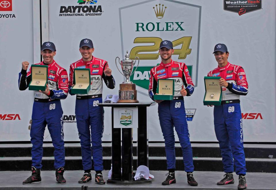 The no.60 team from Meyer Shank Racing celebrates their Rolex 24 win with brand new Rolex watches in Victory Lane on Sunday, January, 29th,2023.