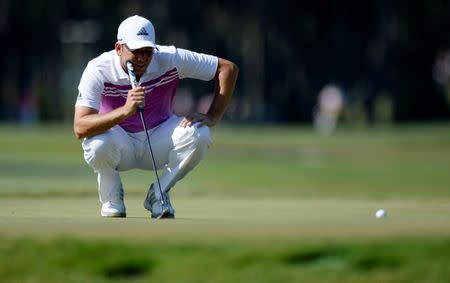 May 10, 2015; Ponte Vedra Beach, FL, USA; Sergio Garcia lines up a putt on the 11th green during the final round of The Players Championship at TPC Sawgrass - Stadium Course. Mandatory Credit: Jake Roth-USA TODAY Sports