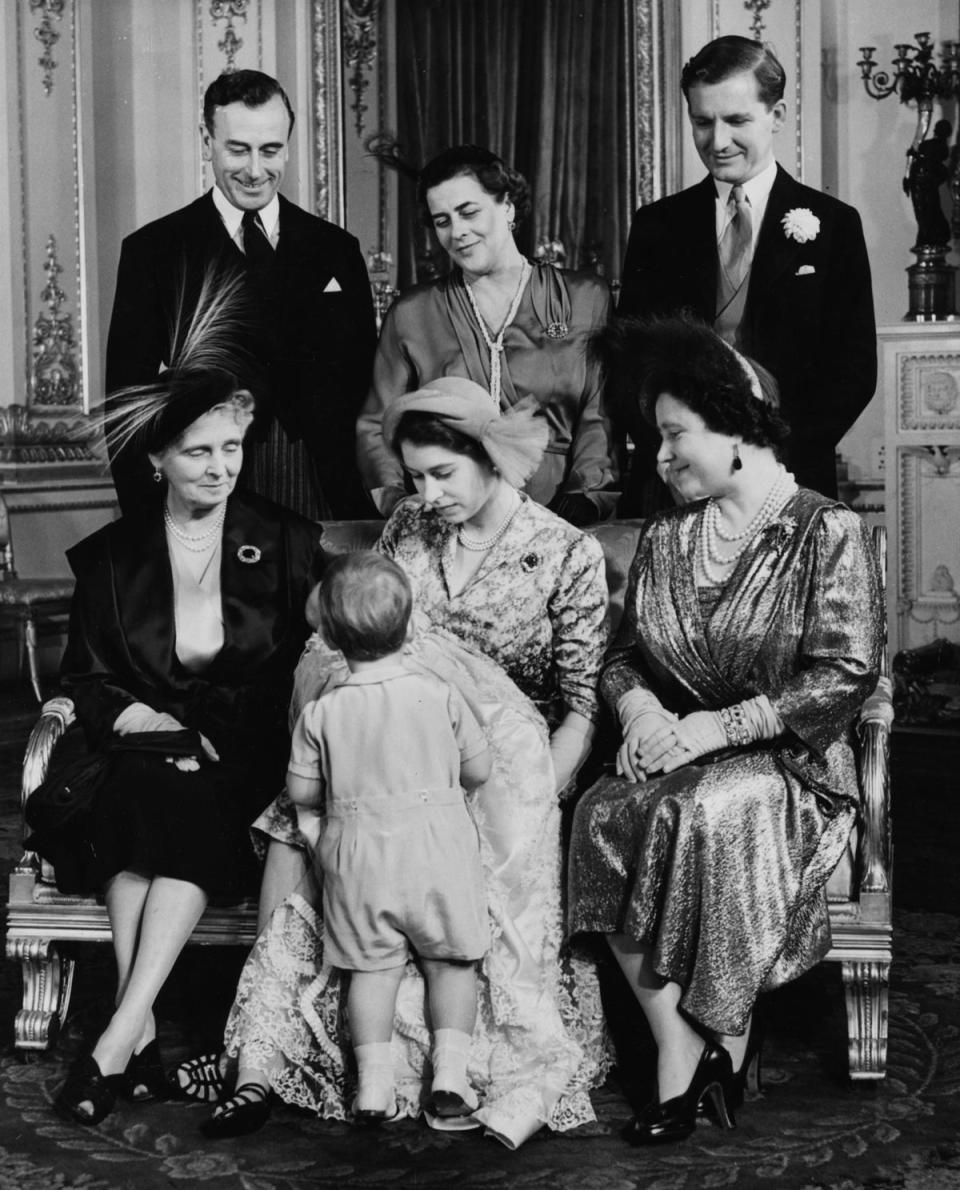 Princess Anne, 1950: The royal family can be seen gathered around the Queen and her baby, Princess Anne, in this photo, taken on 21 October 1950.Earl Mountbatten, Princess Margarita of Hohenlohe-Langenburg, and Prince Charles were in attendance at the ceremony which was conducted by the Archbishop of York, Cyril Foster Garbett. The baby wore the royal Honiton lace christening robe. (Getty Images)