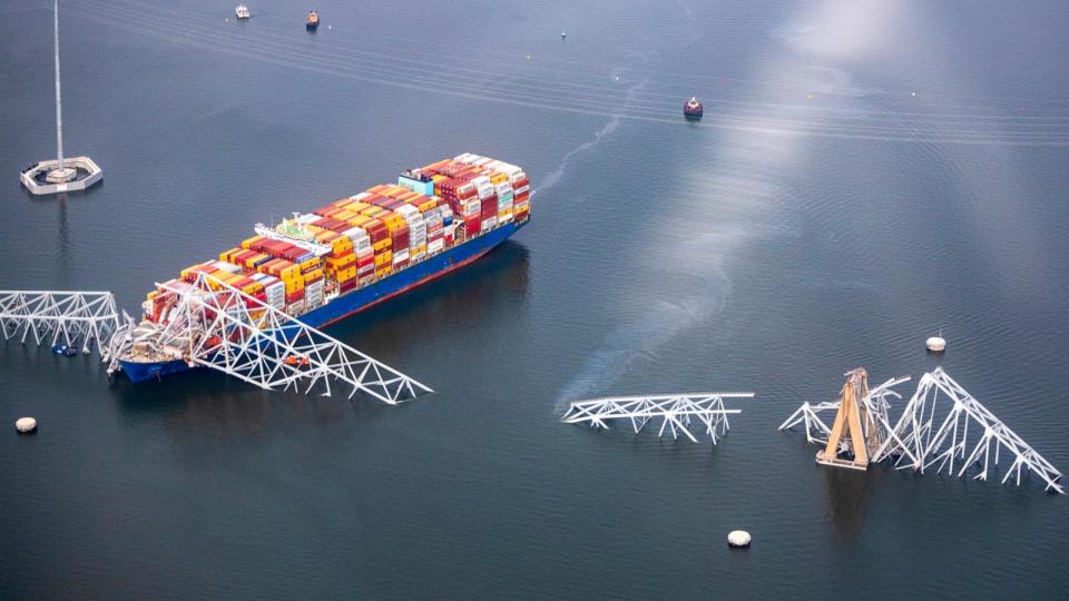 PHOTO: In an aerial view, cargo ship Dali is seen after running into and collapsing the Francis Scott Key Bridge, March 26, 2024, in Baltimore. (Tasos Katopodis/Getty Images)