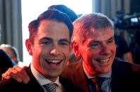 Tom Van Grieken, President of the far-right Flemish separatist party Vlaams Belang reacts with party member Filip Dewinter after the Belgian general and regional elections and European Parliament elections in Londerzeel, Belgium, May 26, 2019. REUTERS/Francois Lenoir