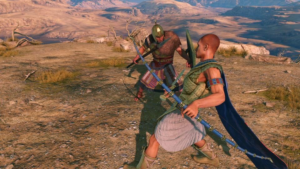 A duel between a spearman and an archer in Total War: Pharaoh.