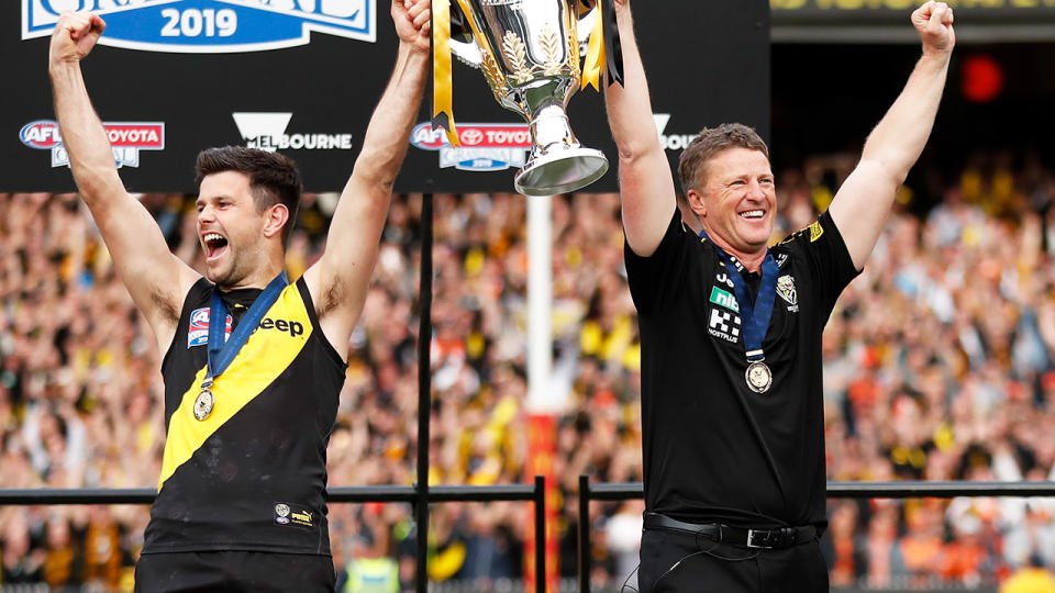 Trent Cotchin and Damien Hardwick, pictured here celebrating with the 2019 premiership cup.