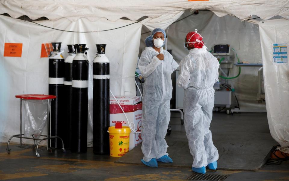 Health workers at a temporary ward at Steve Biko Hospital in Pretoria, South Africa - Reuters