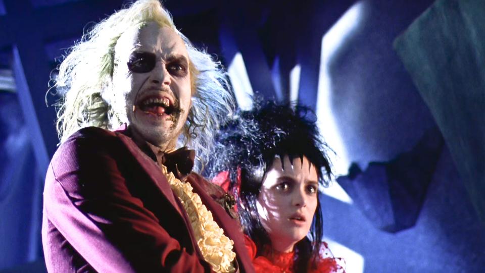 Michael Keaton as Beetlejuice with Winona Ryder as Lydia Deetz