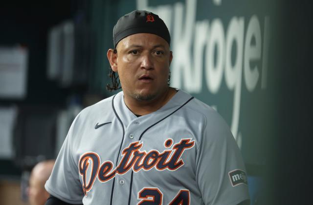 Detroit Tigers' Miguel Cabrera (24) and his family enter the field