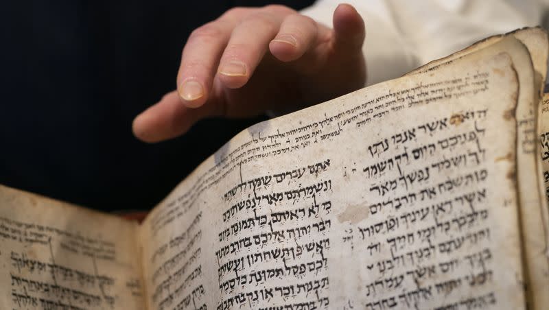 Sotheby’s unveils the Codex Sassoon for auction, Wednesday, Feb. 15, 2023, in the Manhattan borough of New York. The auction house is billing the lot as the “earliest, most complete Hebrew Bible ever discovered.” 